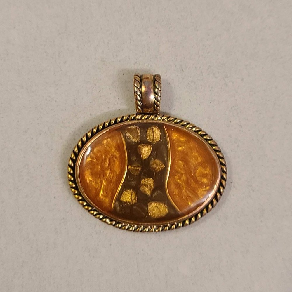Kenneth Cole Amber Colored Pendant with Gold Detailing